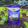 Bag of Milky Spore powder for Japanese beetle control in a garden setting